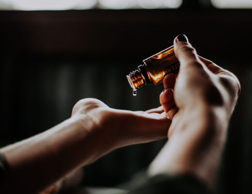 woman using essential oils for allergies