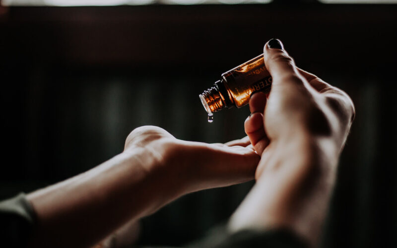 woman using essential oils for allergies